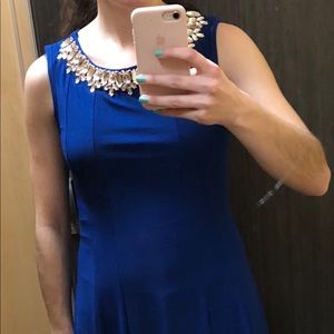 Blue dress with silver beading on top.
